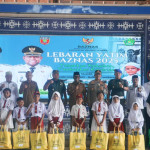 Bersama Baznas Pemda Malteng Bagikan Seragam Sekolah dan Insentif Penghulu